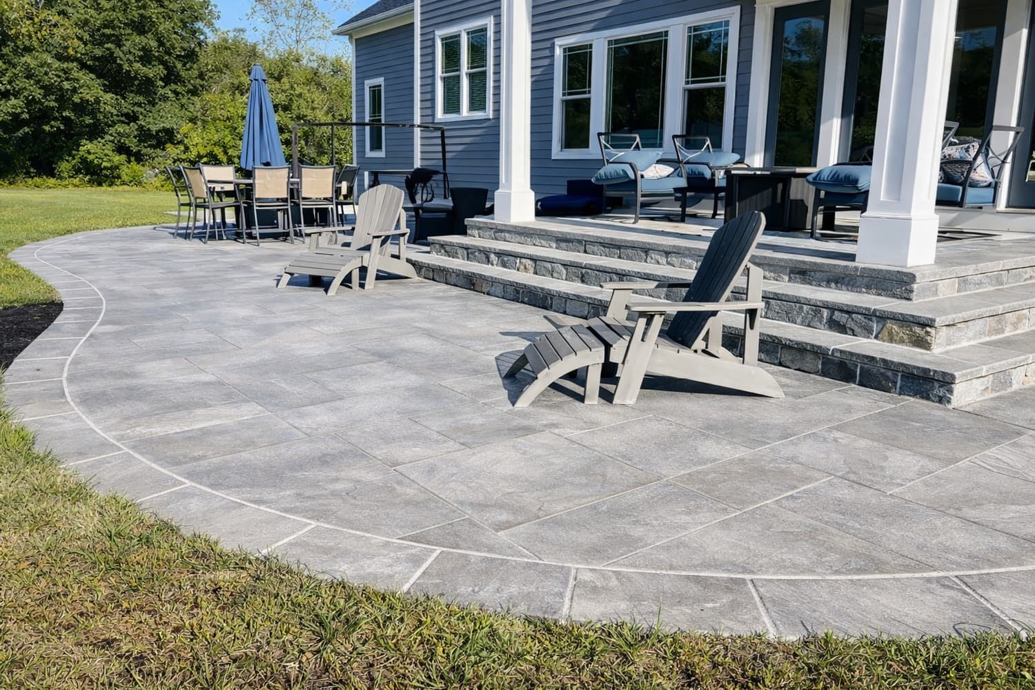 Complete backyard landscape build with lawn, trees and stone features