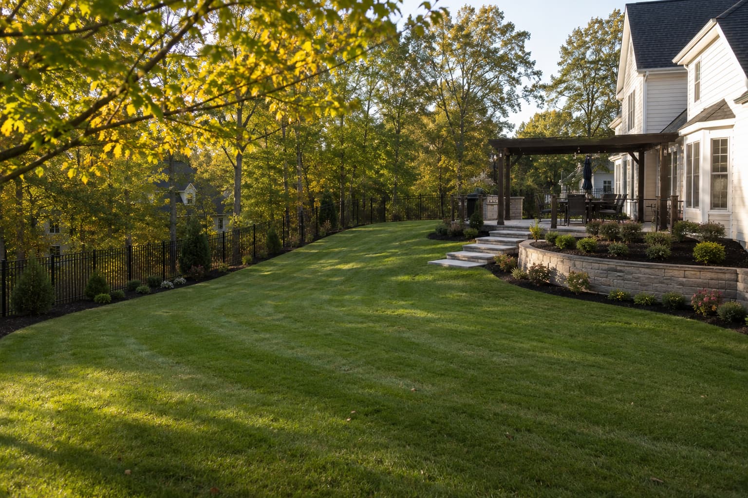 Rolling green lawn graded across a gentle slope